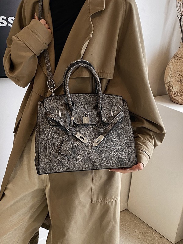 Bolso de platino simple retro ventas calientes de mujeres nuevas moda transfronterizas de alta calidad Kelly bolso de hombro de gran capacidad