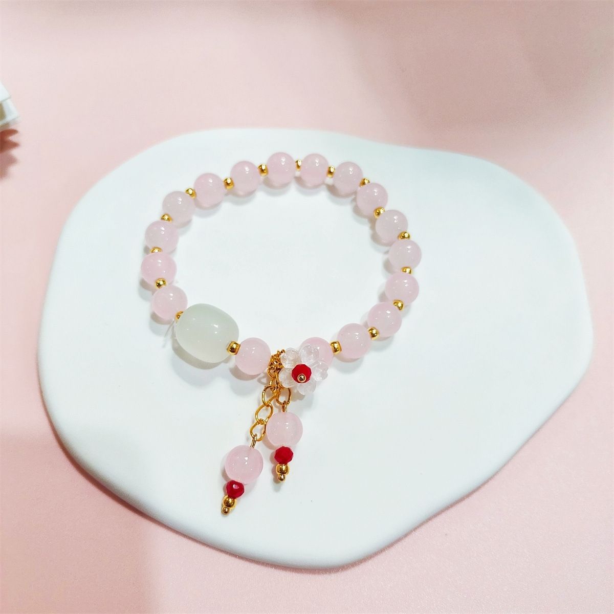 Polvo colgante de flores de melocotón