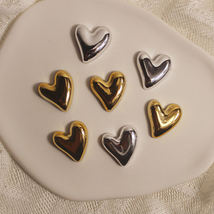 Fashion personality crooked heart earrings retro simple new earrings women's light luxury high-end earring material