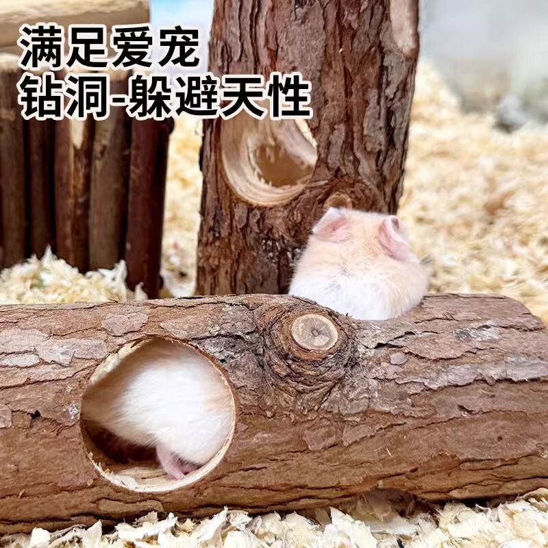 金糸熊のおもちゃは巣の木の杭のハムスターのおもちゃのケージの造景のフェンスを避けて穴を開けてトンネルを開けて退屈して部屋を避けます。|undefined