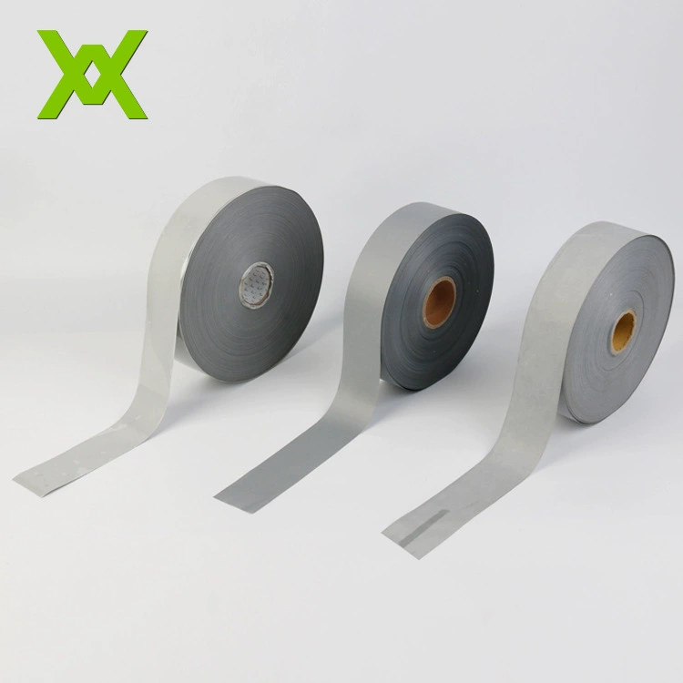 Yongkang Wan Xiaoliang Silver TC Светоотражающая ткань Светоотражающая полоса Светоотражающий материал Аксессуары для поверхностей одежды Швейная Серебряная светоотражающая ткань