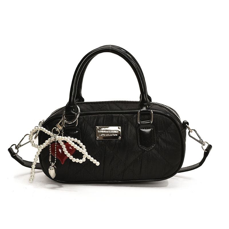 Bolsa de bolos de mano popular de este año para mujeres 2025, nueva bolsa de hombro de tendencia universal de alta calidad, bolso cuadrado de estilo extranjero