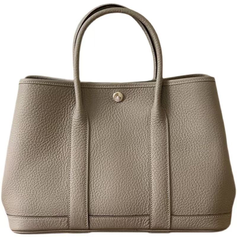 2025 nuevo estilo jardín Baotou capa TOGO bolso de piel de vaca bolso de compras de gran capacidad bolso femenino de moda