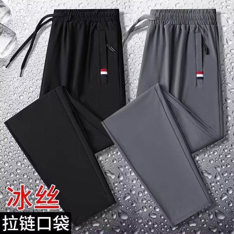 Camisas y menos ropa, pantalones de seda de hielo, pantalones de chándal elásticos finos de verano, pantalones rectos de hombre con cremallera de bolsillo al por mayor al por mayor