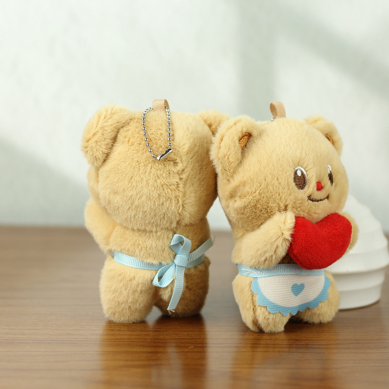 Red celebridad amor mantequilla oso muñeca colgante bolsas escolares muñeca de peluche de dibujos animados pequeña muñeca colgante llavero