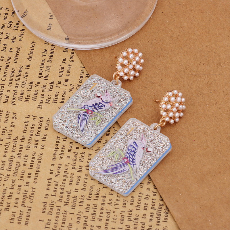 Trendy European and American mahjong-themed earrings featuring red, yellow, and green elements, a rooster design, a fun pink bow, and sparkling accents – wholesale for cross-border sales Trendy European and American mahjong-themed earrings featuring red, yellow, and green elements, a rooster design, a fun pink bow, and sparkling accents – wholesale for cross-border sales
