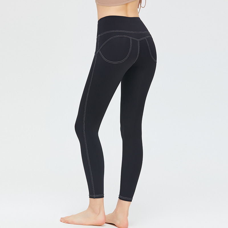 Nueva ropa de Yoga de las mujeres de Bolsillo falso elástico de la cadera melocotón pantalones de alta elástica Pantalones deportivos desnuda sensación sin T-line pantalones de yoga