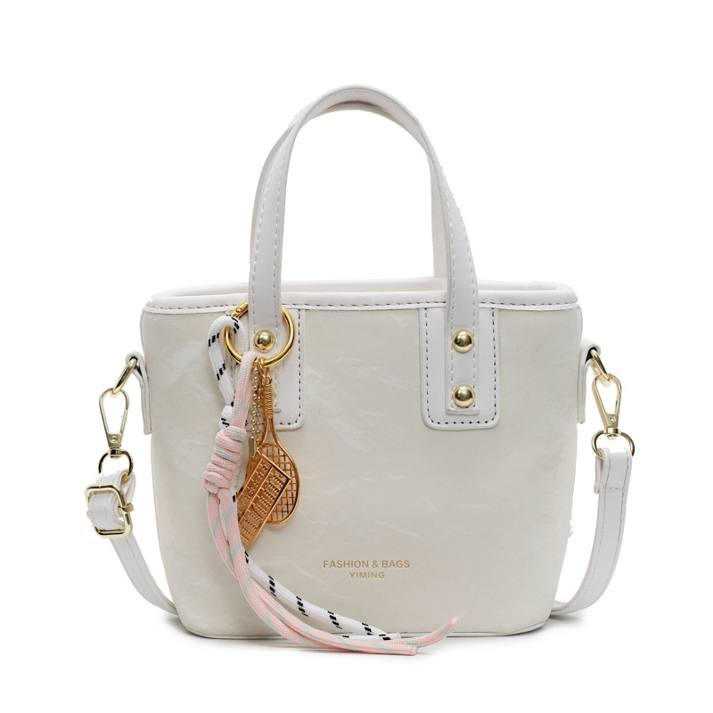 Comercio exterior explosión bolso de cubo de mano mujer 2025 nuevo simple bolso de hombro casual red explosión bolso de mochila coreano