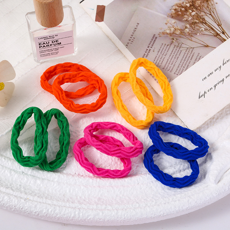 Explosiones clásicas super asequibles 10 colores anillo de cabello grueso de alta elasticidad sin costuras toalla jacquard anillo de goma cubierta de cuero