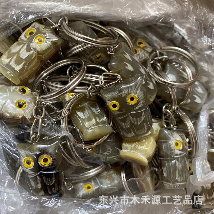 牛の角の丈夫で丈夫なキーホルダー車のロックは生肖の小動物の牛の角の製品の工芸品の車のアクセサリーを掛けます。|undefined