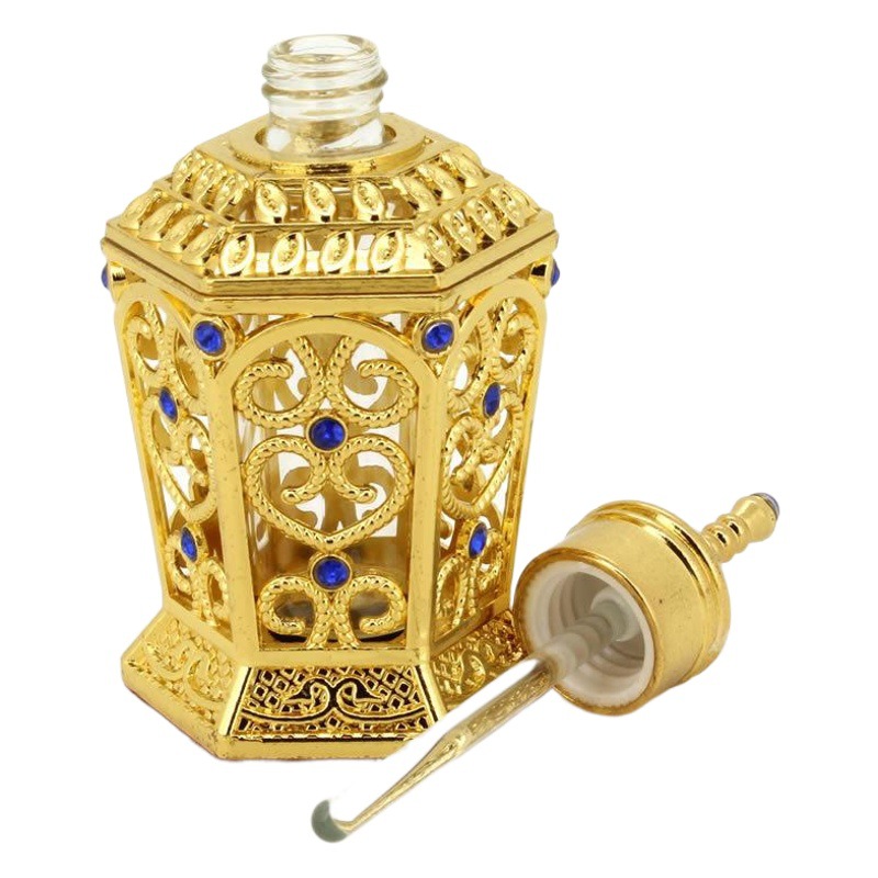 Joyería de aceite esencial neto en stock al por mayor 10ML hexágono dorado Oriente Medio botella de perfume botella de aceite esencial sub-embalaje botella vacía adornos