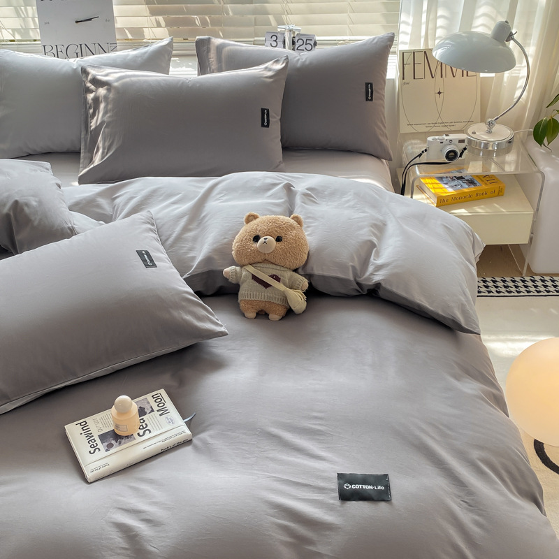 Algodón simple de cuatro piezas de color sólido cubierta de edredón de algodón dormitorio de estudiantes de tres piezas de cama de algodón de lana larga cuatro piezas de algodón