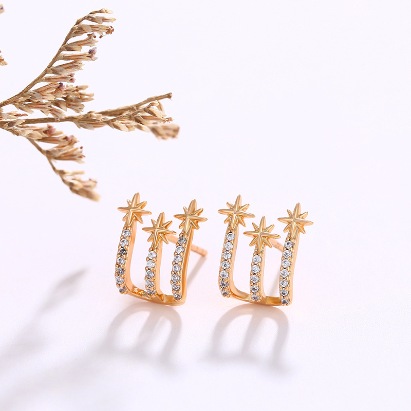 Joyería de Xuping Amazon transfronteriza pendientes de moda femenina nicho diseño sentido apilado ocho Awn estrella pendientes al por mayor