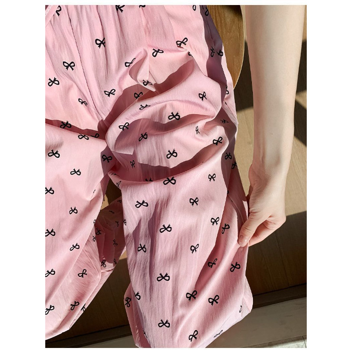 Cuatro estaciones pijamas primavera y otoño dulce delgamiento correa de impresión de arco de verano pantalones largos de invierno pantalones caseros se pueden usar al por mayor