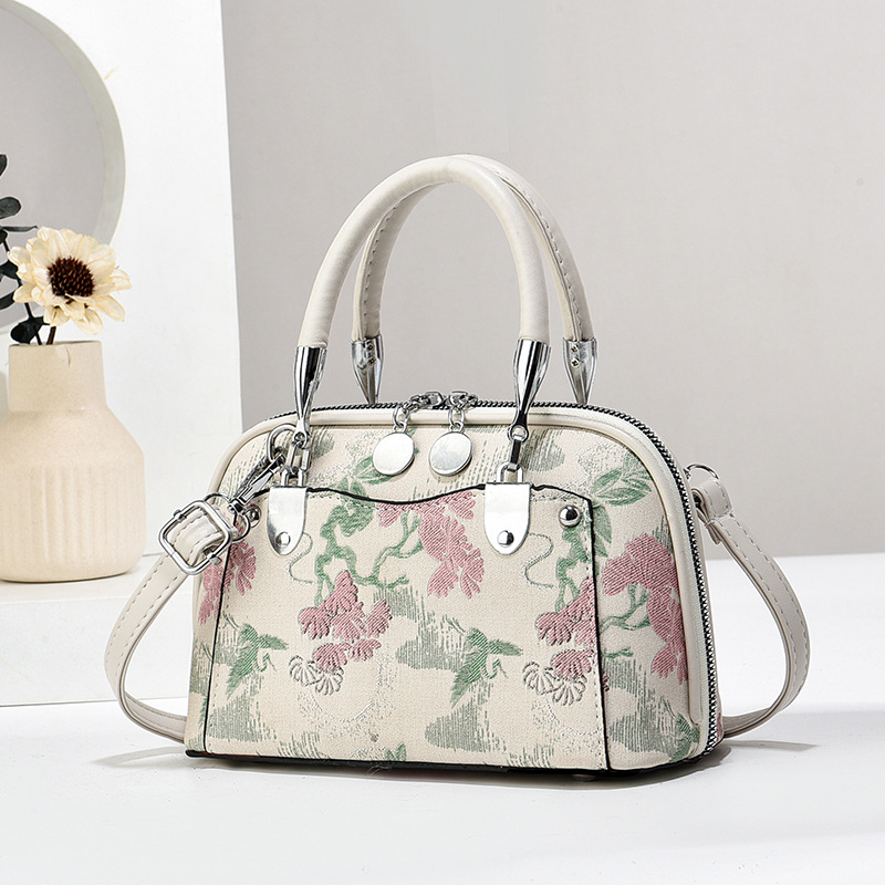 Fabricantes de bolsos de mujer bolsos de mano atmósfera textura bolsos de hombro de gran capacidad bolsos de mochilas bolsos de comercio exterior