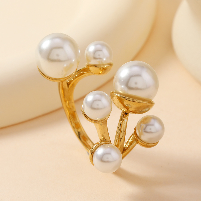 Anillo de perlas de moda europea y americana no se desvanece seis perlas abiertas anillo ligero de lujo de alta calidad joyas de acero inoxidable