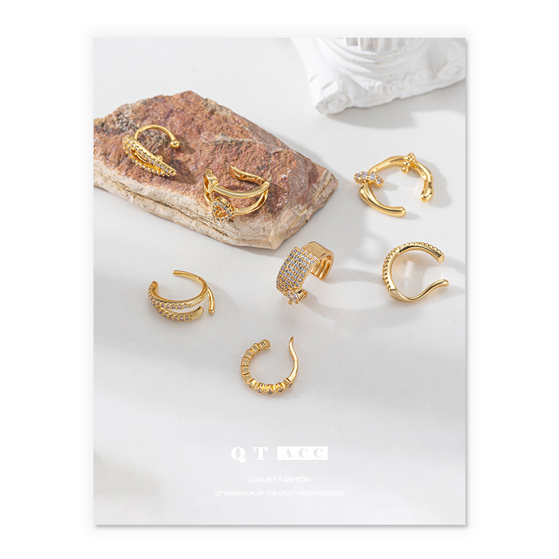 Lujo ligero, alta calidad, personalidad, pendientes irregulares, adornos de circón, diseño de apertura, clip de hueso de oreja de temperamento, nuevo estilo de moda