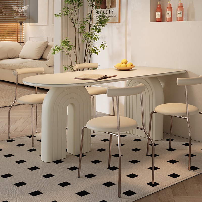 Mesa y silla de comedor de estilo francés de estilo crema de viento de roca, mesa de comedor de la península de diseño moderno y simple.