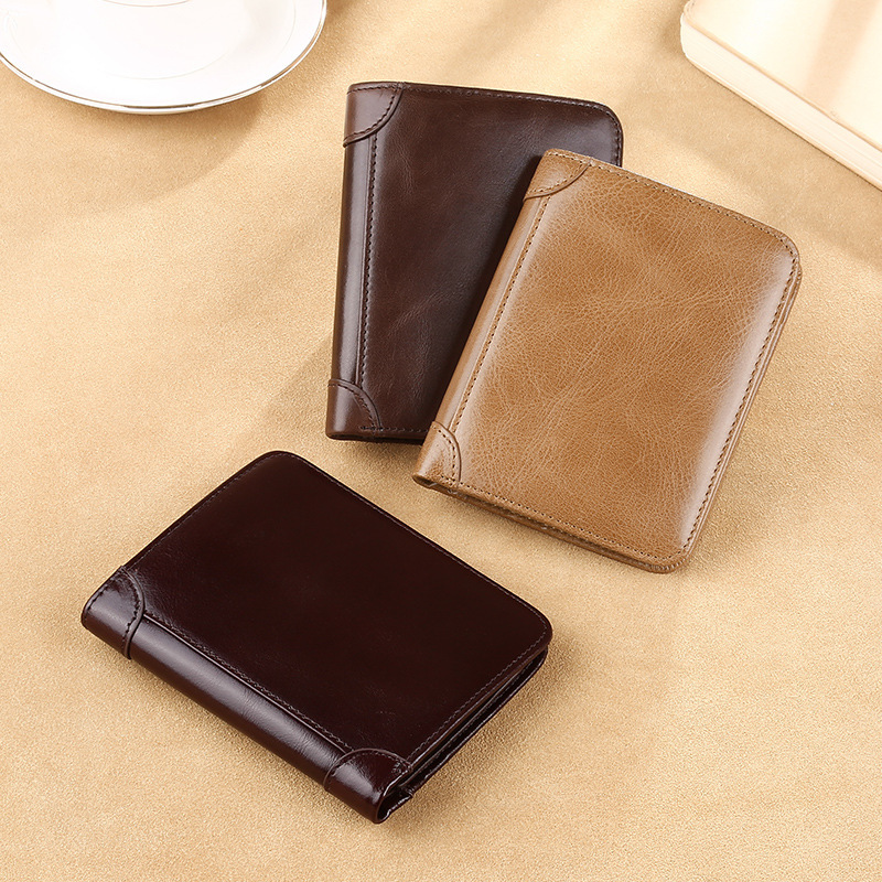 Guangzhou fábrica de cuero billetera de cuero de vaca de hombre, cartera de cuero de vaca de primera capa, cartera de cuero ultrafina de hombre corta, explosión de comercio exterior