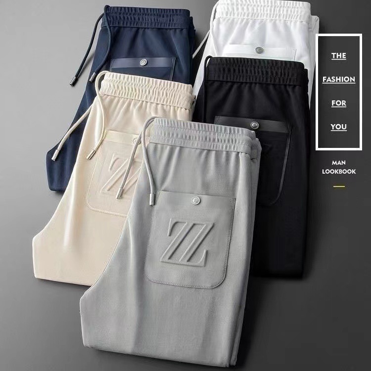 Herrenbekleidung Freizeithosen für Männer dünne Strickstickerei gepresster Kleber dreidimensionaler Modetrend All-Match-Sport-Slim-Fit-Jogginghose für Männer_voghion.com