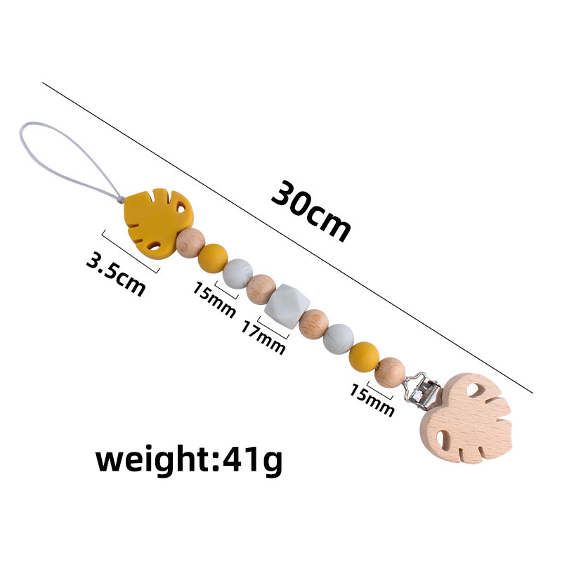 Suministros para bebés creativo clip de chupete de hoja de haya juguete mordedor bebé Cadena de chupete de hoja de silicona cadena anti-caída