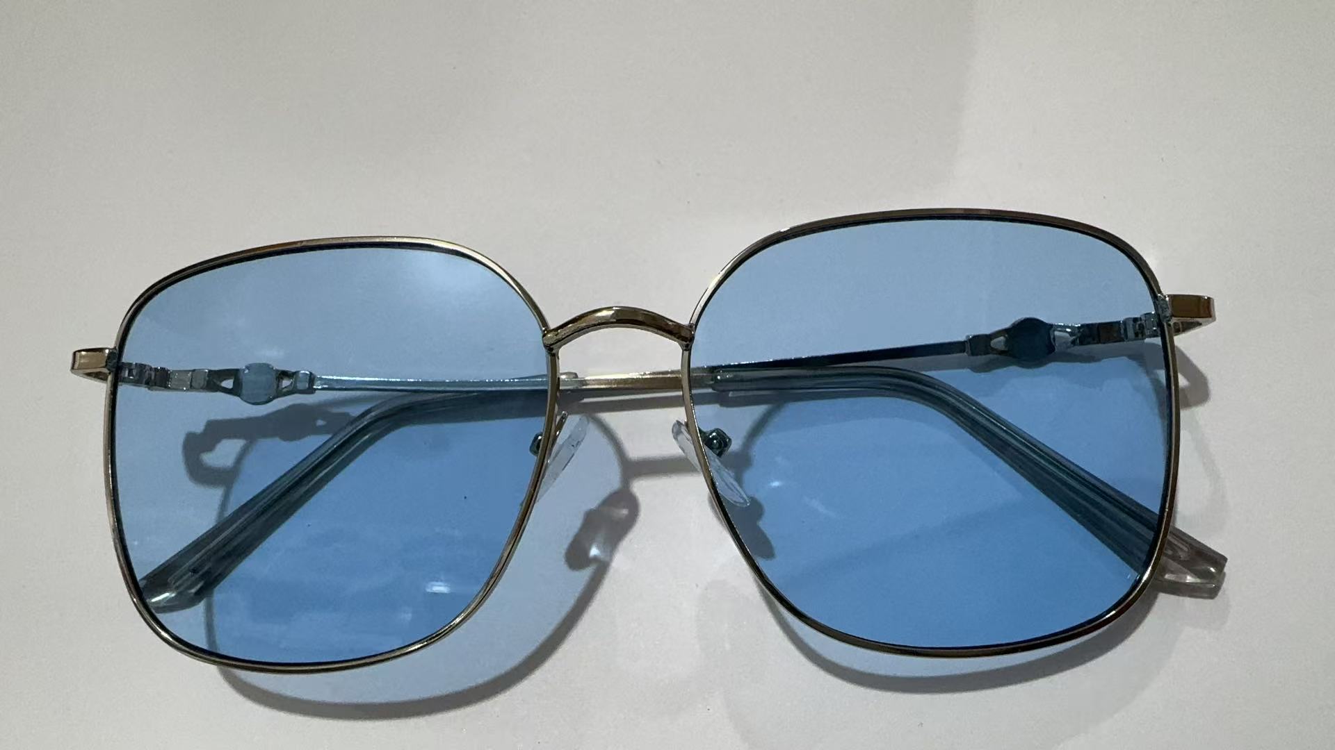 Silver frame blue film