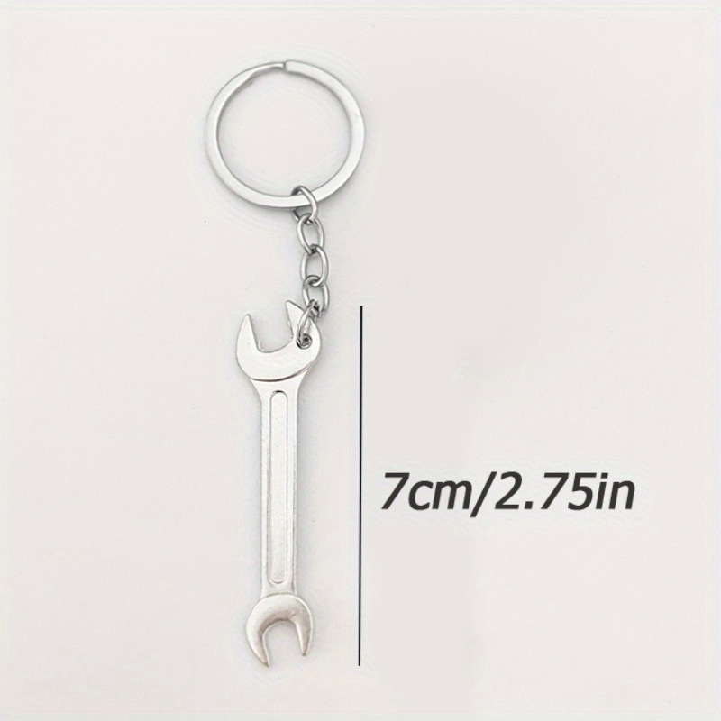 Serie de oro de aleación de venta transfronteriza caliente fútbol béisbol rugby sombrero hechicero puño llavero colgante mochila