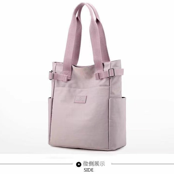 Nuevo bolso de lona, bolso de tela de nailon, bolso informal japonés transfronterizo de gran capacidad con múltiples bolsillos