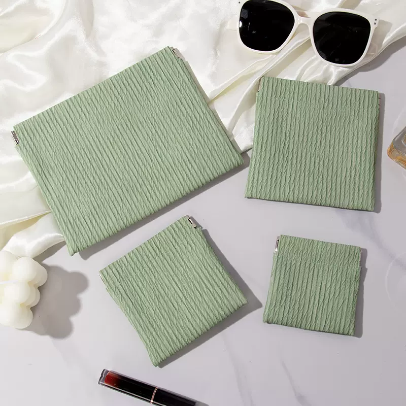 数据线收纳包自动闭合收纳袋ins便携式迷你化妆口红包弹片包