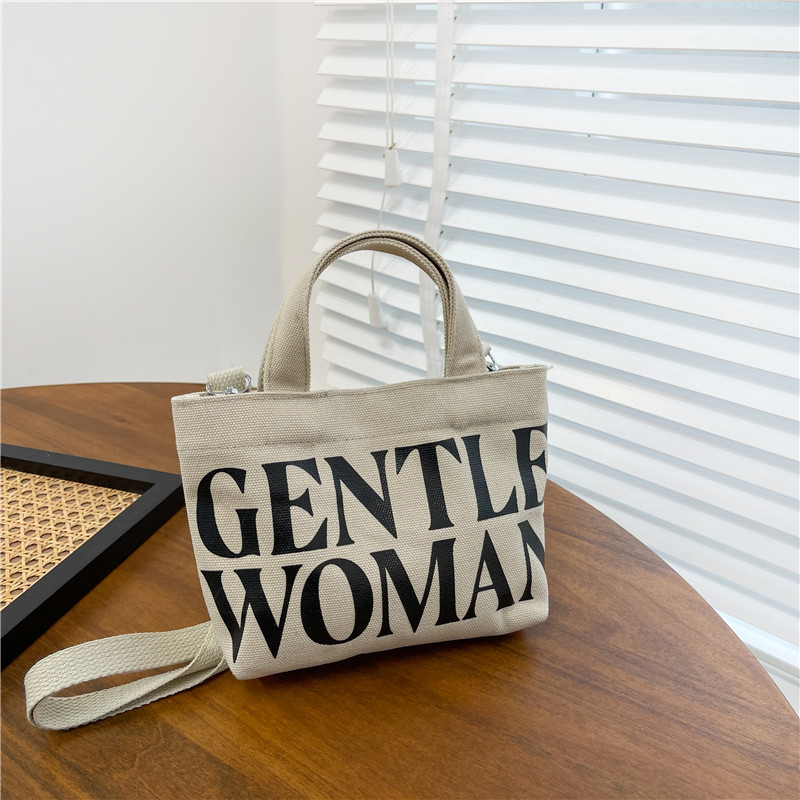 Venta al por mayor transfronteriza GW Tailandia Xiaoyou bolsa de lona diseño de nicho carta portátil de gran capacidad bolsa de mensajero del hombro