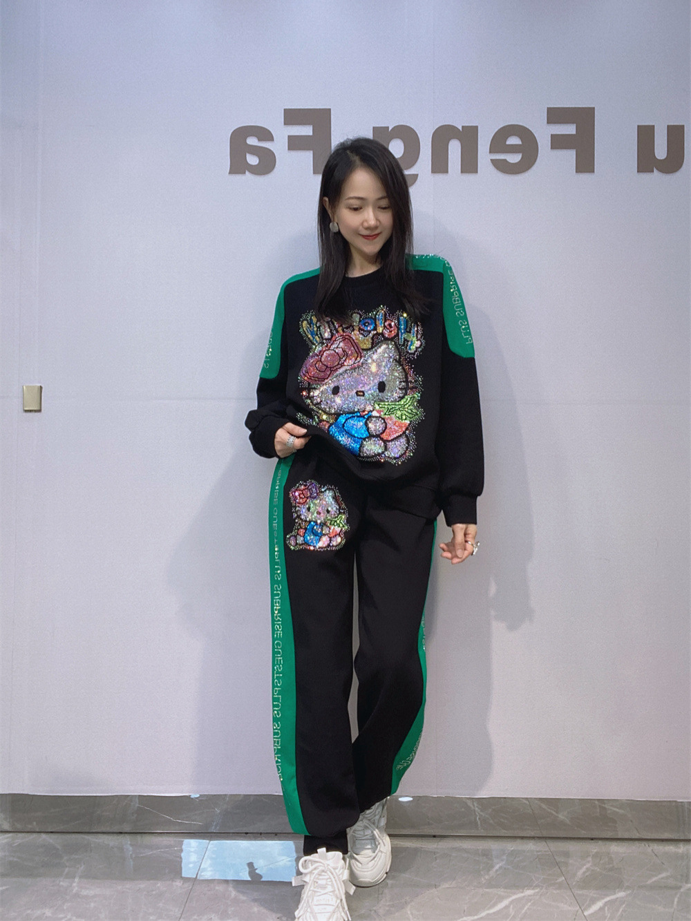 Trajes de moda de la estación europea de la industria pesada caliente taladro chaqueta de manga larga cintura elástica grande pantalones de caída de dos piezas para mujeres