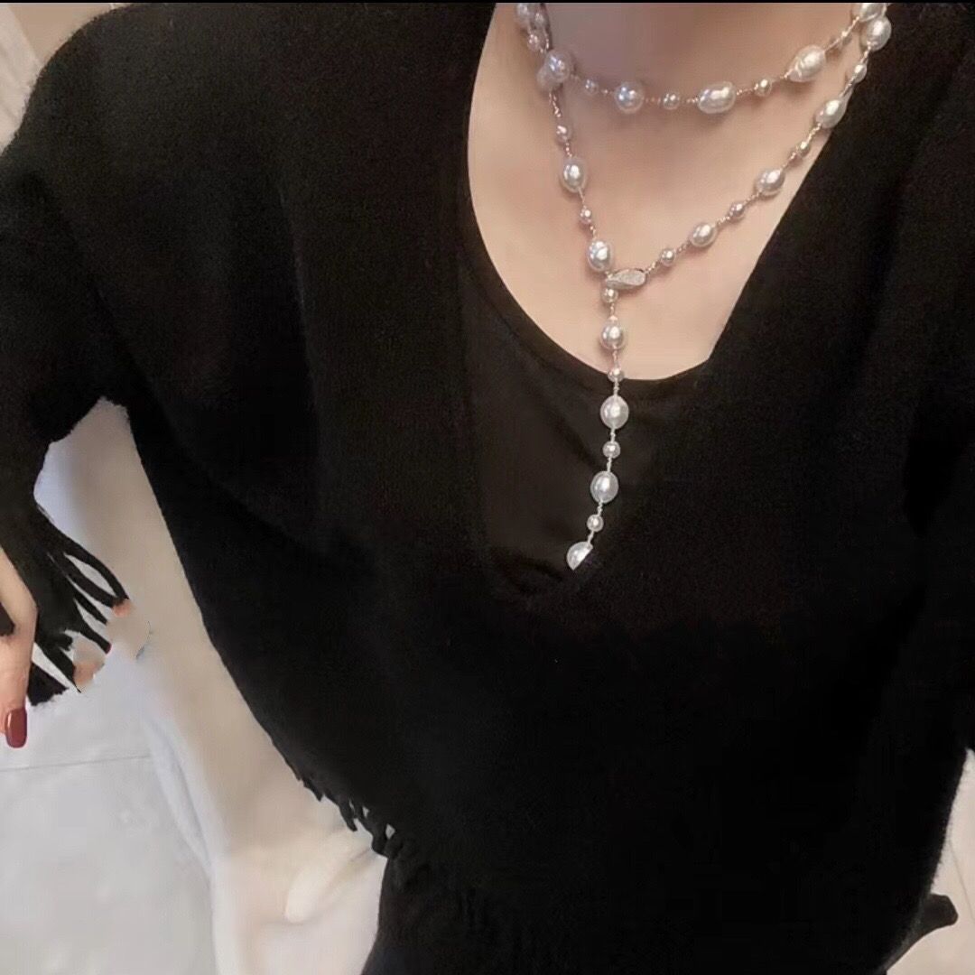 Barroco perla larga cadena de suéter cadena de collar cadena de clavícula un temperamento de uso múltiple 758 cuero artificial