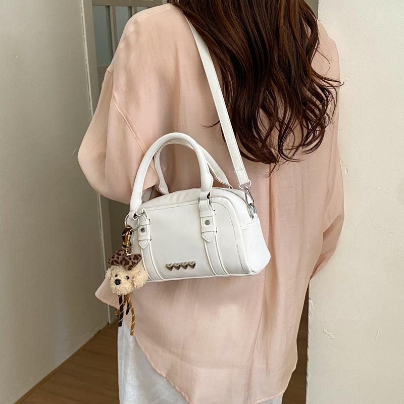 Bolso de mano coreano sensación cotidiana para mujeres 2026 primavera nuevo retro bolso de almohada de hombro para viajar bolso de mujer