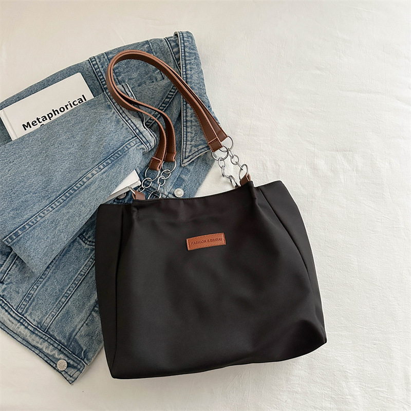 Casual bolsa de viaje de gran capacidad para mujeres 2024 nueva moda bolsa de lona universal bolso de hombro universal bolso simple