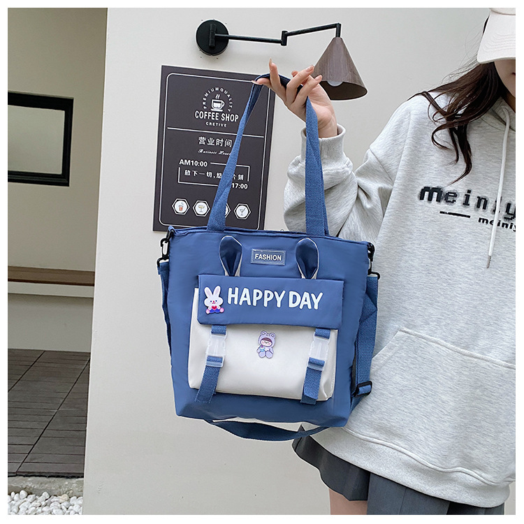 Large-capacity file bag, primary school student handbag that can be carried on one shoulder, book bag for girls with high appearance standards, homework books and test papers bag undefined