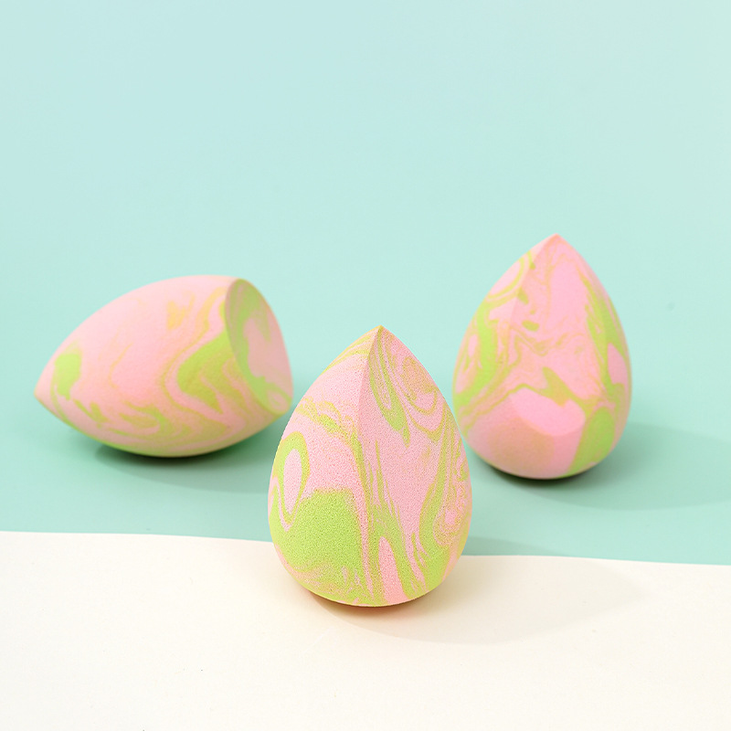 La borla de polvo de huevo de belleza de color mixto transfronterizo se agranda cuando se encuentra con el agua, gotas de agua sin látex, esponja de maquillaje en forma de calabaza, personalización de fábrica de huevos