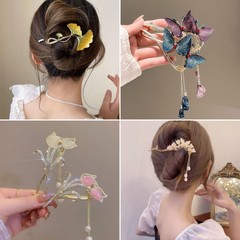 新商品の鈴蘭の蝶のフリンジヘアは女性の後頭部を挟みます。