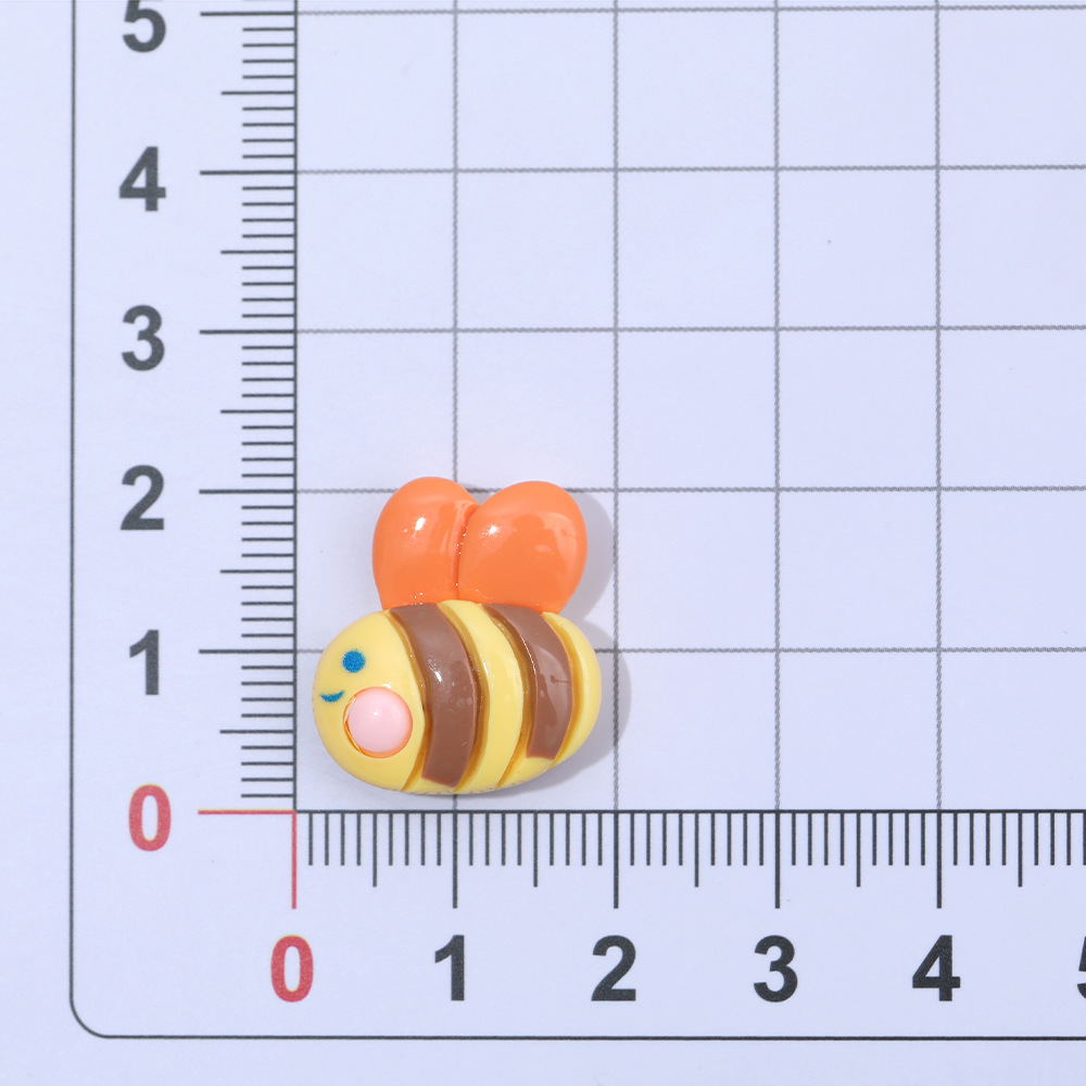 Macaron color pastoral abeja mariposa resina accesorios DIY crema pegamento accesorios para el cabello teléfono móvil Shell accesorios hechos a mano al por mayor