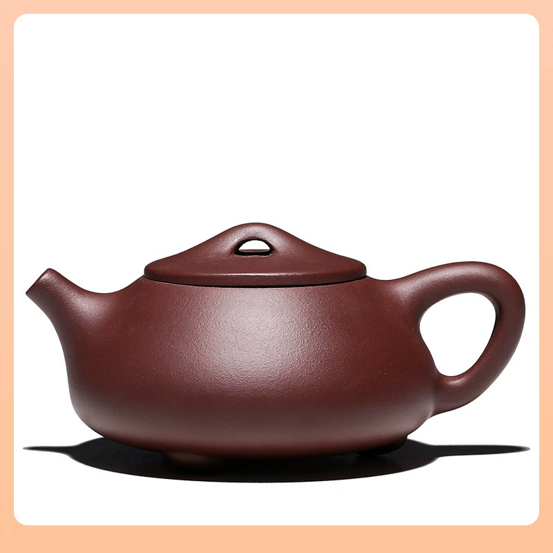 Purple clay teapot made of old mud, Yixing famous brand, fully handmade purple clay teapot, stone ladle teapot with ball holes on the inner wall, teapot manufacturer