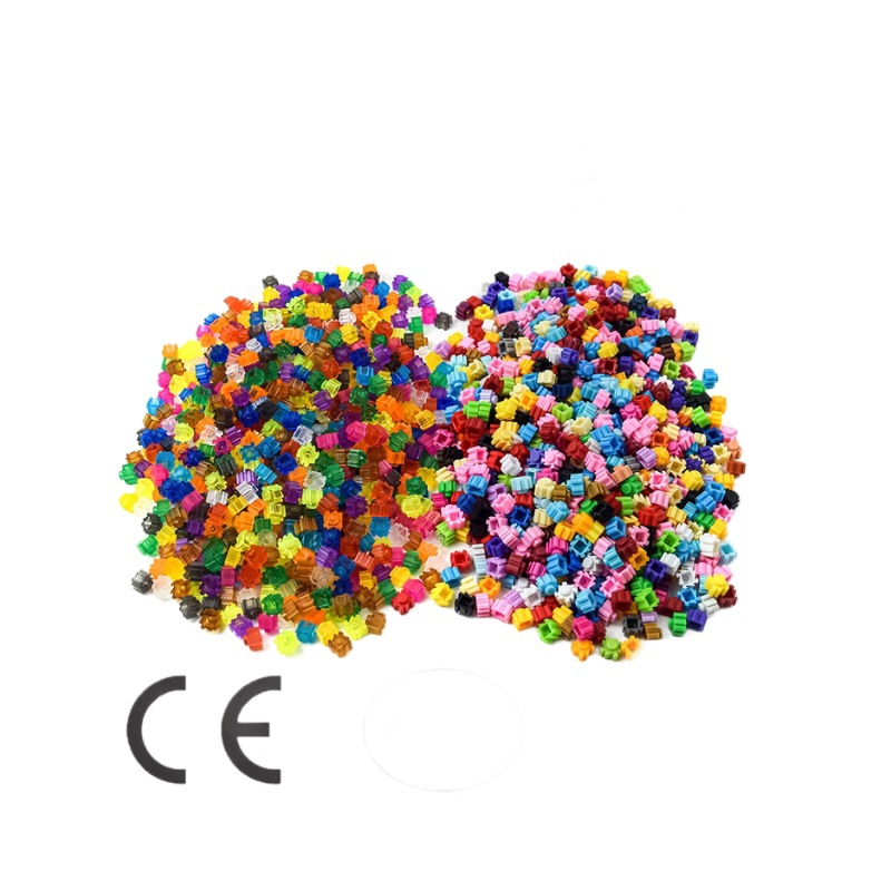 Bloques de construcción de la serie de partículas pequeñas que ensamblan juguetes al por mayor incompatibles con rompecabezas de oso Lego rompecabezas tridimensional para niños a granel