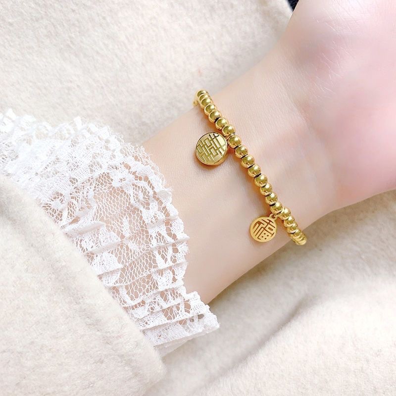 De Acero de titanio de color de retención de oro rosa pulsera de la suerte de la mujer rojo neto mismo estilo de todos los partidos de moda pulsera de moda accesorios de moda