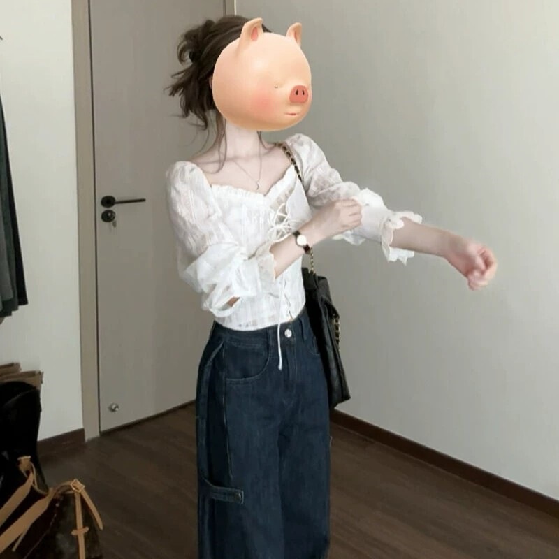 French-style white lace-trimmed long-sleeve off-shoulder blouse for women, 2026 new design, unique short shirt