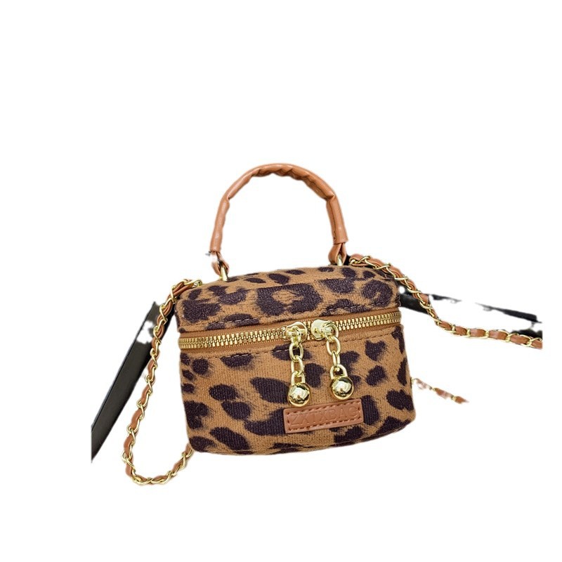 Bolsos para niños de nuevo estilo Bolsos de hombro para niños y niñas con estampado de leopardo de moda coreana Bolsos de mensajero de cadena de bebé con lazo de estilo occidental