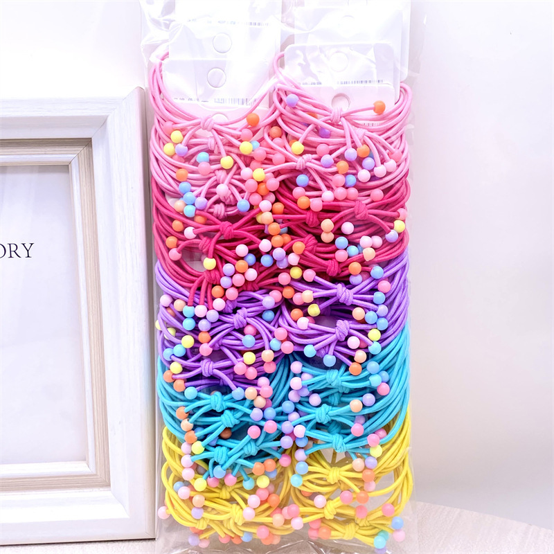 La versión coreana de la tarjeta colgante de té leche adornos de cabello nudo cinta de cuentas de cuerdas de alta elasticidad cuatro en uno correa de goma 2 tienda