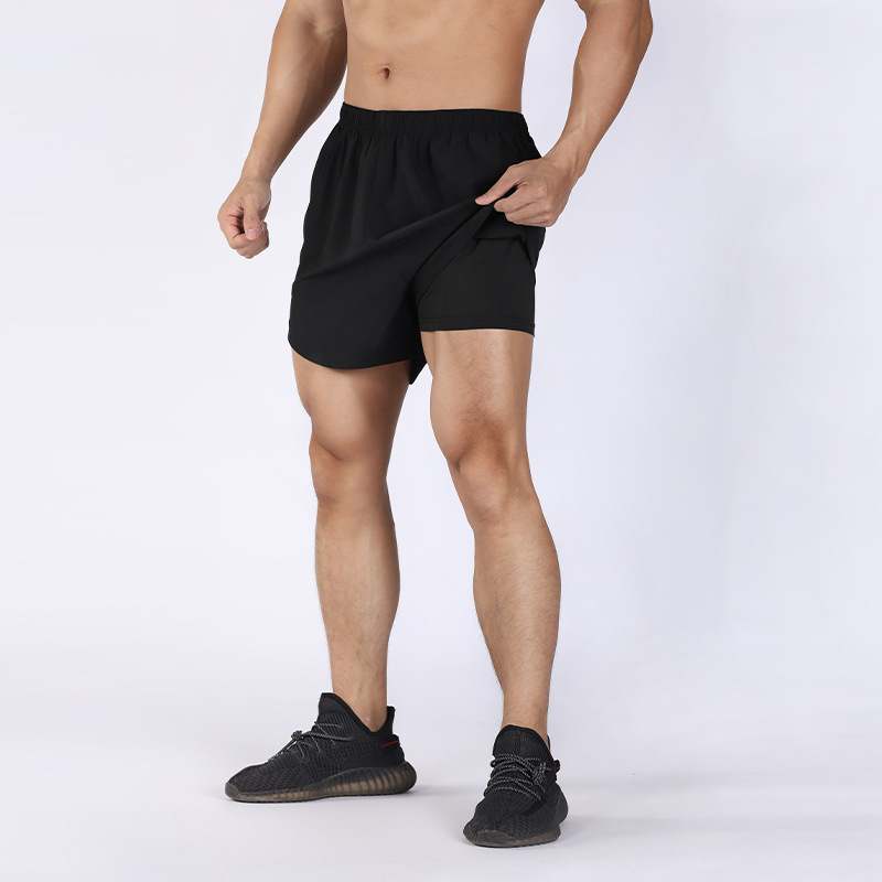 2020 pantalones cortos deportivos de verano para hombres transpirables de secado rápido sueltos más tamaño quinto pantalones correr fitness tejido pantalones de entrenamiento