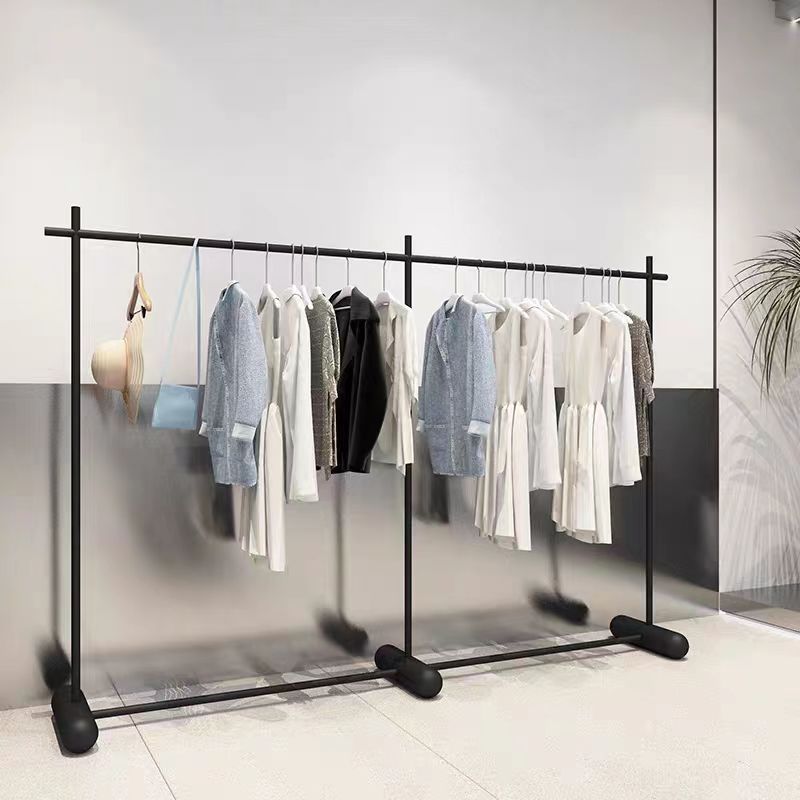 Tienda de ropa negro negro negro de hierro forjado estante de exhibición red centro comercial estante de exhibición de ropa de mujer estante de isla colgando tipo colgante de suelo