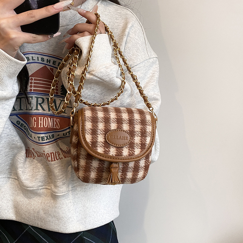 2025 bolsas de hombro de niños y niñas de estilo coreano, bolsas de cadena mini compactas para bebés, bolsas de cambio para niños de comercio exterior transfronterizo