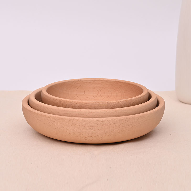 Suministro directo de fábrica, platos creativos de madera de haya, platos de madera maciza, platos de madera seca, platos de madera excavados en toda la madera, grandes cantidades y preferenciales