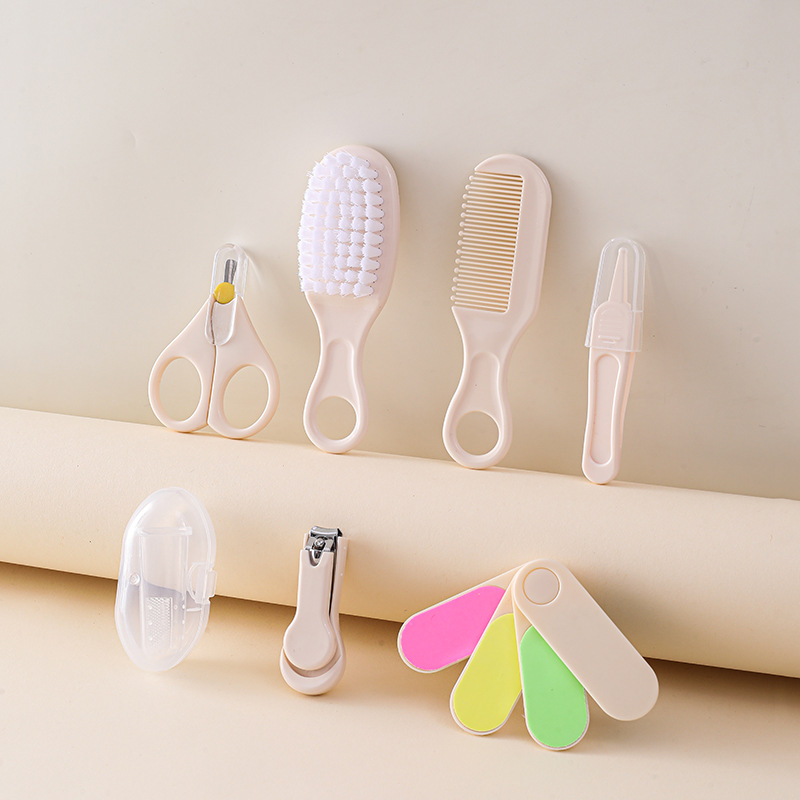 Set de cuidado para bebé de 7 piezas, incluye cortaúñas, cepillo y peine - Mayorista