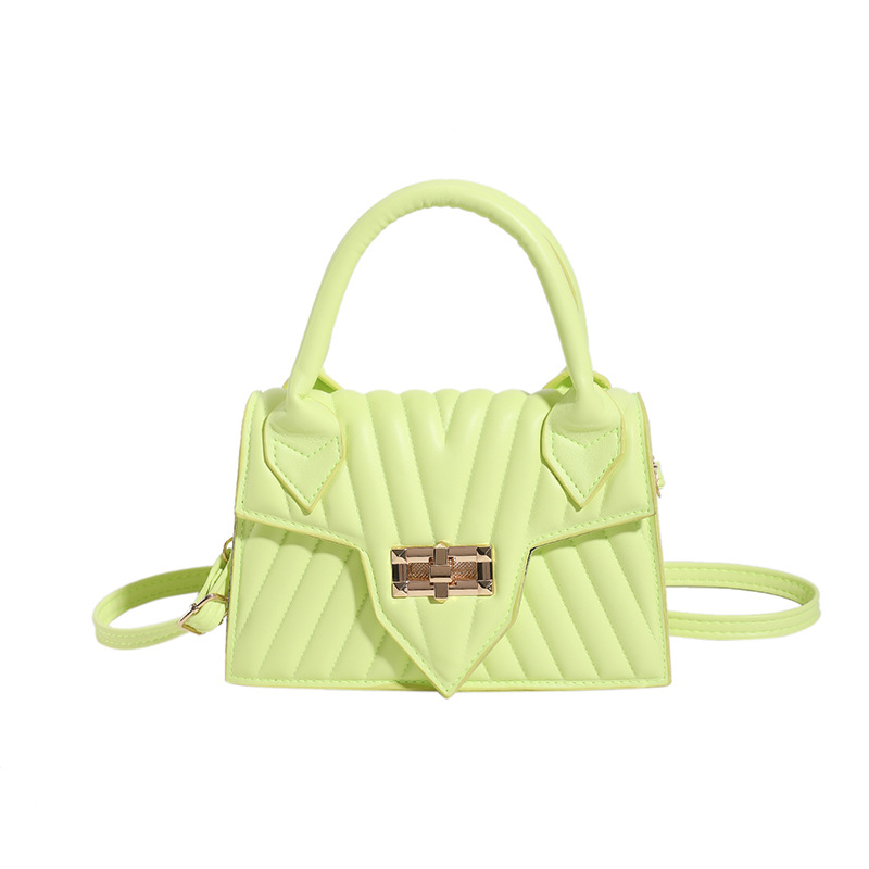 Textura 2025 nueva moda de impresión de estilo extranjero rotary-lock mochila de hombro casual color caramelo bolso de mano de mujer